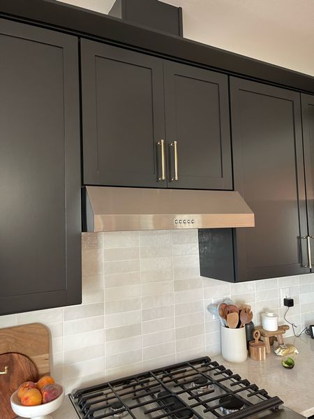 Kitchen detail, vent hood, brass handle pulls, backsplash 

#LTKhome