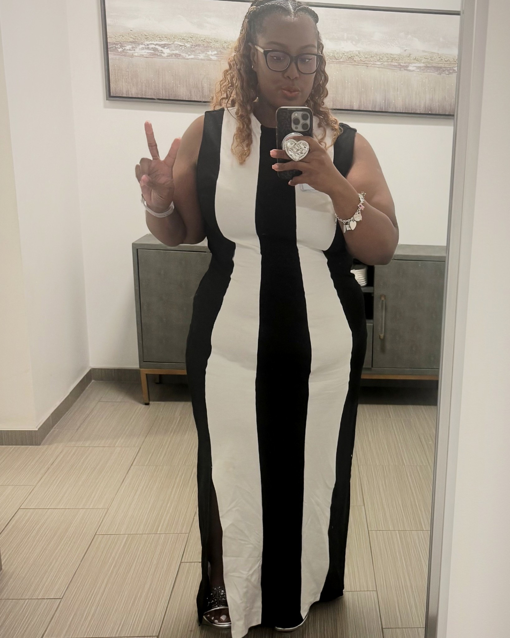 In office fit check ✨ This Eloquii dress gave me business casual with a little spice — perfect for looking polished but staying cool in this Texas heat (because it’s fall everywhere else but still summer here 😅). Paired it with classic Tory Burch sandals for comfort + style. Linked this exact dress and a few similar shoes you can shop now 🤍🖤

#LTKWorkwear #LTKFallSale #LTKPlusSize