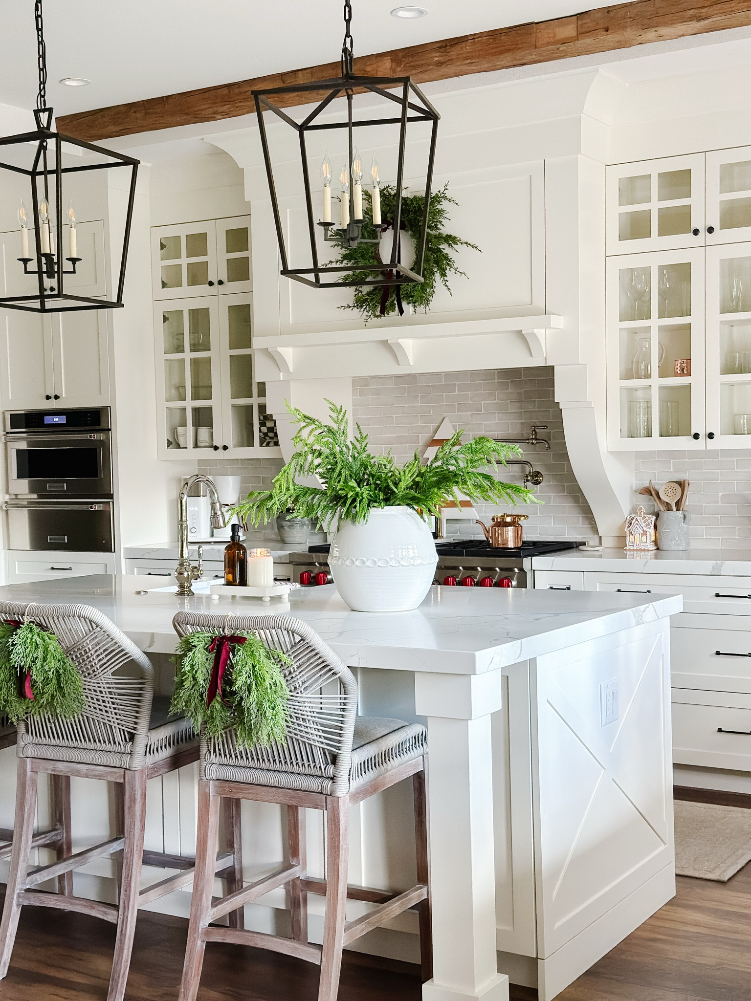 Christmas Kitchen
Kitchen Stools
White ceramic Vase
Greenery stems

#LTKHome #LTKHoliday