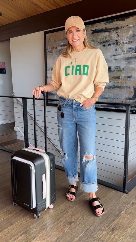 TRAVEL OUTFIT: Comment LINKS & I’ll send outfit links to your DM!
•
Quick road trip to visit my mom over the weekend!🍂 Didn’t even need to pack a suitcase—I could’ve lived in this comfy casual outfit the entire time! Obsessed with this @shopclarev Ciao sweatshirt (size up—I’m wearing a large!) and my jeans are an LSW bestseller and less than $50! (sized up two sizes for a relaxed fit). First time packing my @roam carryon and I was so impressed with how much it fit!🙌🏼

Travel outfit, loose jeans, old navy, French sweatshirt, big buckle Birkenstock, weekend outfit, casual outfit, packing tips, airport outfit 

#LTKover40 #LTKfindsunder50 #LTKtravel