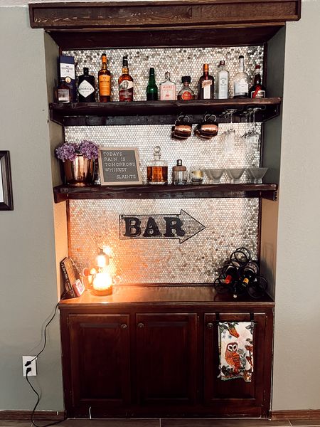 DIY built in bar using peel & stick tiles from Amazon! Linking my bar decor including wine rack, candle warmer and vintage martini glasses 🍸🥃 cheers!

#LTKhome