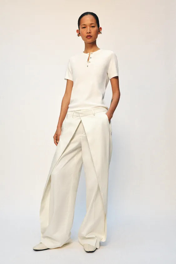 Soft-touch knit top with a round neck and short sleeves. Featuring front buttons. | Zara UK