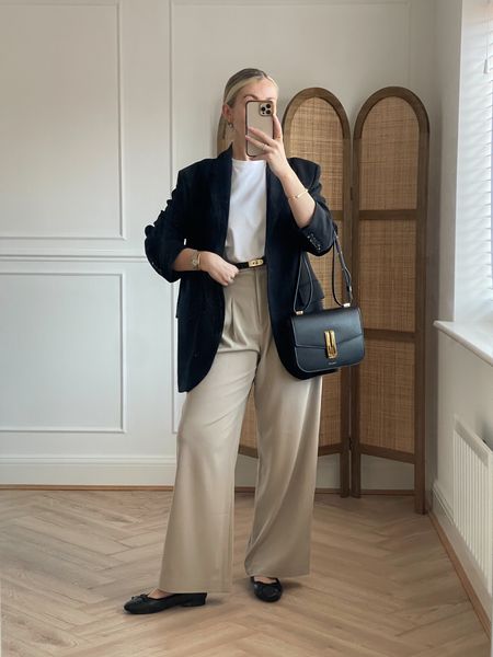 Black blazer, white t-shirt, wide leg trousers in beige, leather ballet flats, crossbody bag, gold belt

#LTKstyletip #LTKeurope #LTKSeasonal