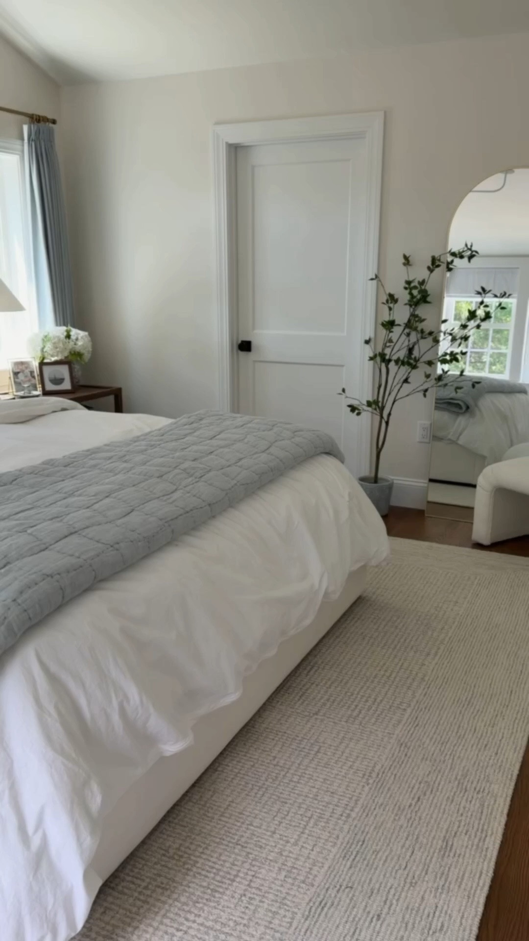 Modern coastal primary bedroom with touches of blue that is functional and beautiful! Shop it here! Pottery Barn quilt on sale!

#LTKHome

#LTKSaleAlert #LTKHome