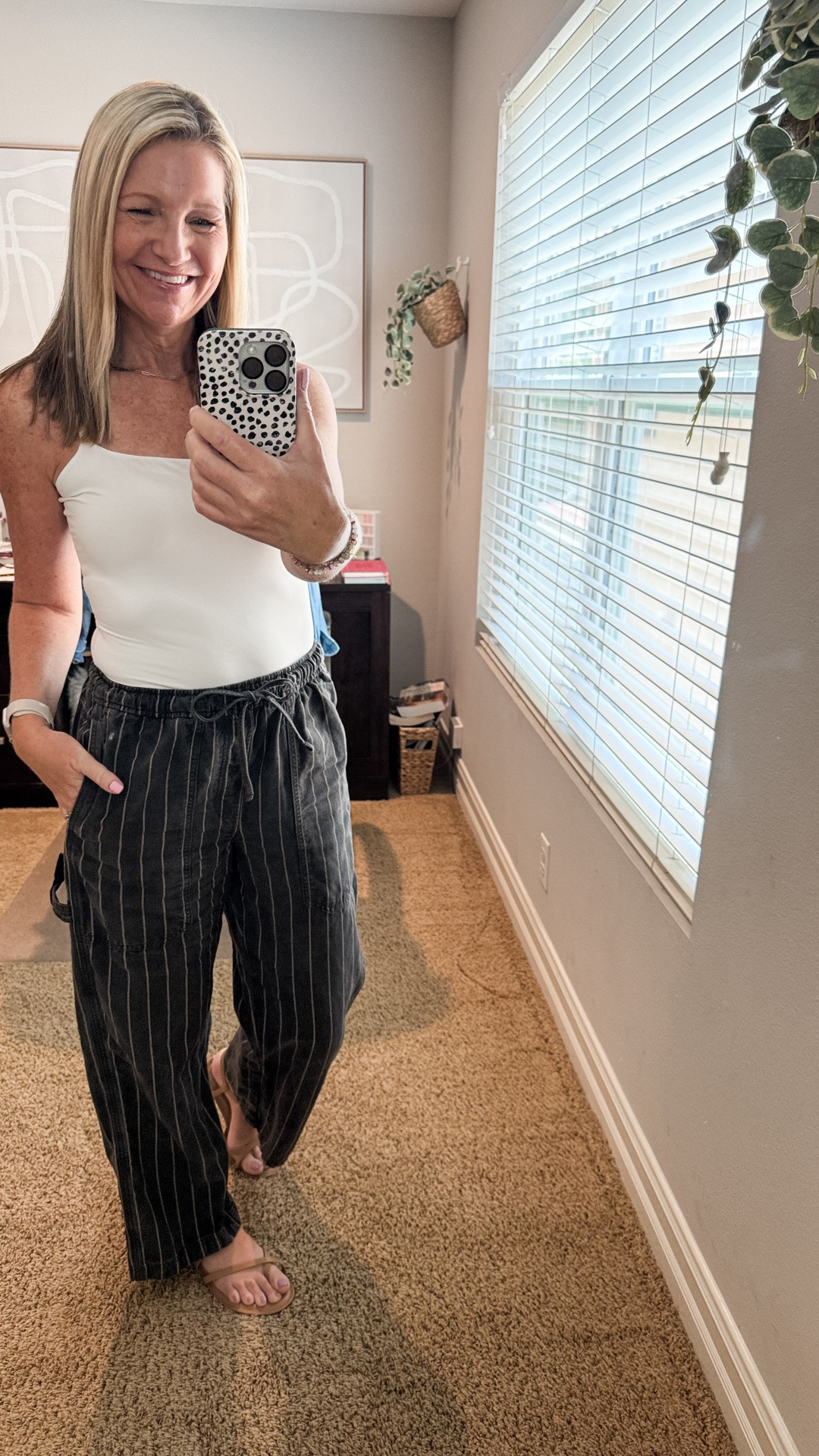 When the layering tank becomes the outfit. I own this Pumiey tank in black and just recently ordered the white version as well. It is so incredibly soft and is double lined so not sheer at all. It works well for these 100 degree days but also works under my favorite layers. 

My pants are Aerie and currently sold out but linked a few other options. My Target sandals are selling fast but currently on clearance.

#LTKootd #LTKSeasonal #LTKOver40