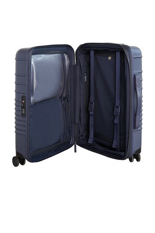 The 21" Carry-On Roller in Navy | Revolve Clothing (Global)
