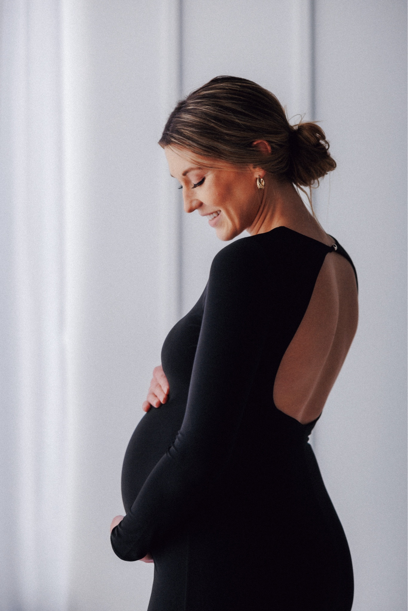 Black long sleeve backless maxi dress perfect for maternity photos - wearing size 6.

*Linking similar options!*

#LTKBump #LTKStyleTip #LTKBaby