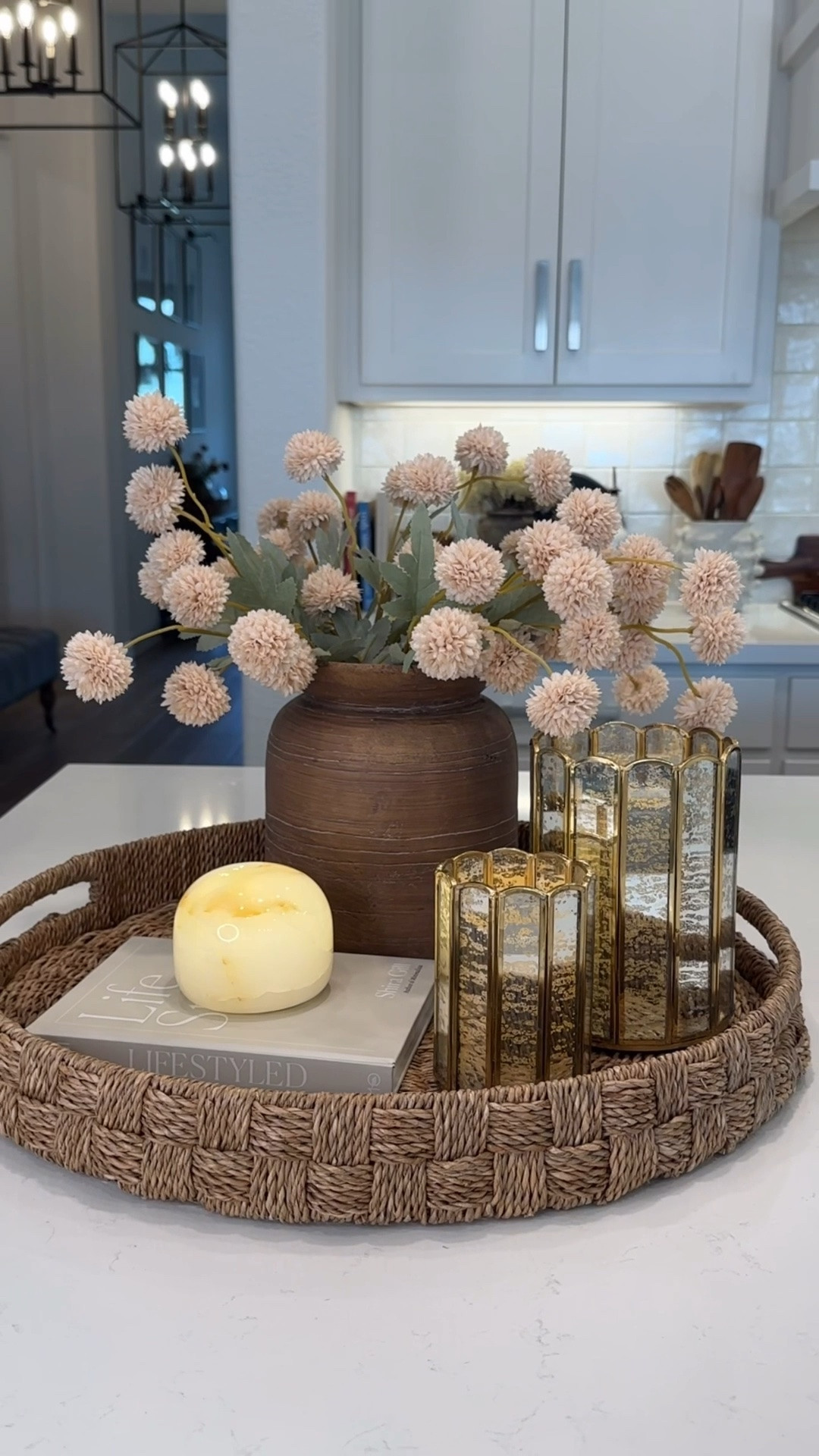 Sometimes the smallest styling moments make the biggest impact.
For this tray arrangement, I layered soft pom pom flowers, elegant glass hurricanes, and timeless neutral textures—but the real star of the show is this gorgeous marble light. 🤍
It adds the perfect warm glow while bringing in that beautiful natural stone element that makes a space feel elevated and collected. The combination of organic textures, soft florals, and ambient lighting creates a look that feels both cozy and designer-inspired.
Proof that creating a beautiful home doesn't have to be complicated—just a few thoughtfully chosen pieces styled together can completely transform a space. ✨
Which piece catches your eye first: the pom pom flowers, the hurricanes, or the marble light? 🤍
#TrayStyling #CoffeeTableDecor #HomeStyling #OrganicModern #NeutralHome #MarbleDecor #HomeDecorInspiration #InteriorStyling  #DesignerInspired

#LTKHome