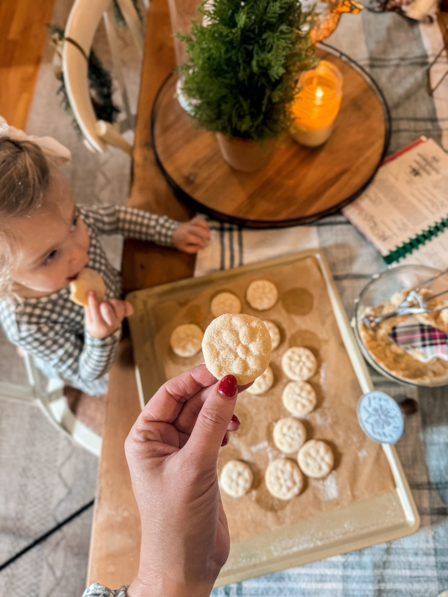 Mommy and me matching pajamas while baking snowflake stamped cookies 

#LTKmomlife #LTKHoliday #LTKKids