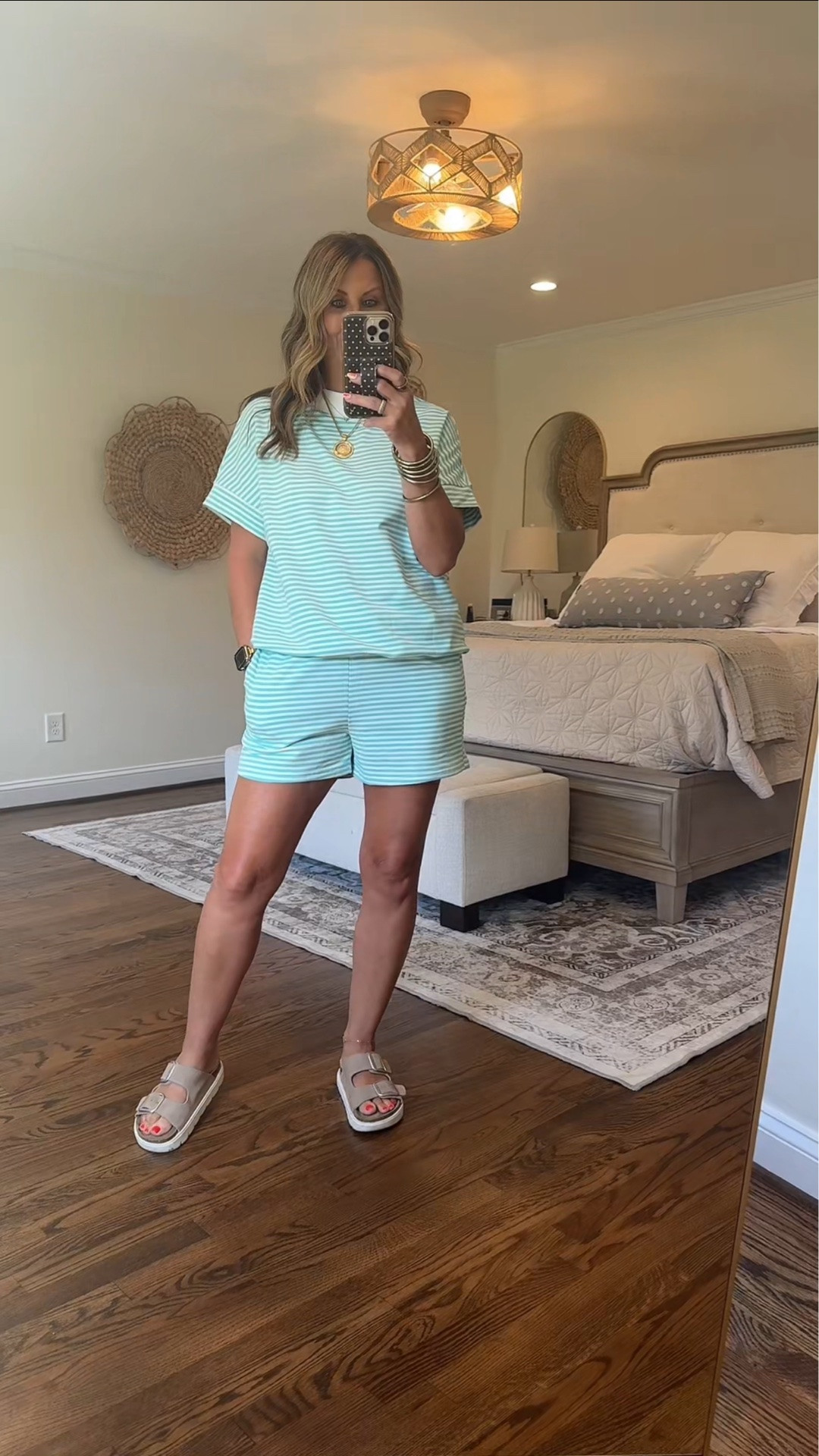 Mint stripes + summer slides = the easiest throw-on-and-go set 🤍 Perfect for errands, lounging, or chasing grandbabies in comfort. I’m 5’4” wearing a medium. #LTKStyleTip #LTKFindsUnder50 #SummerStyle #CasualOutfit #MatchingSet #WomenOver40Style #EverydayStyle #ComfyChic #OOTD #ShortGirlFriendly