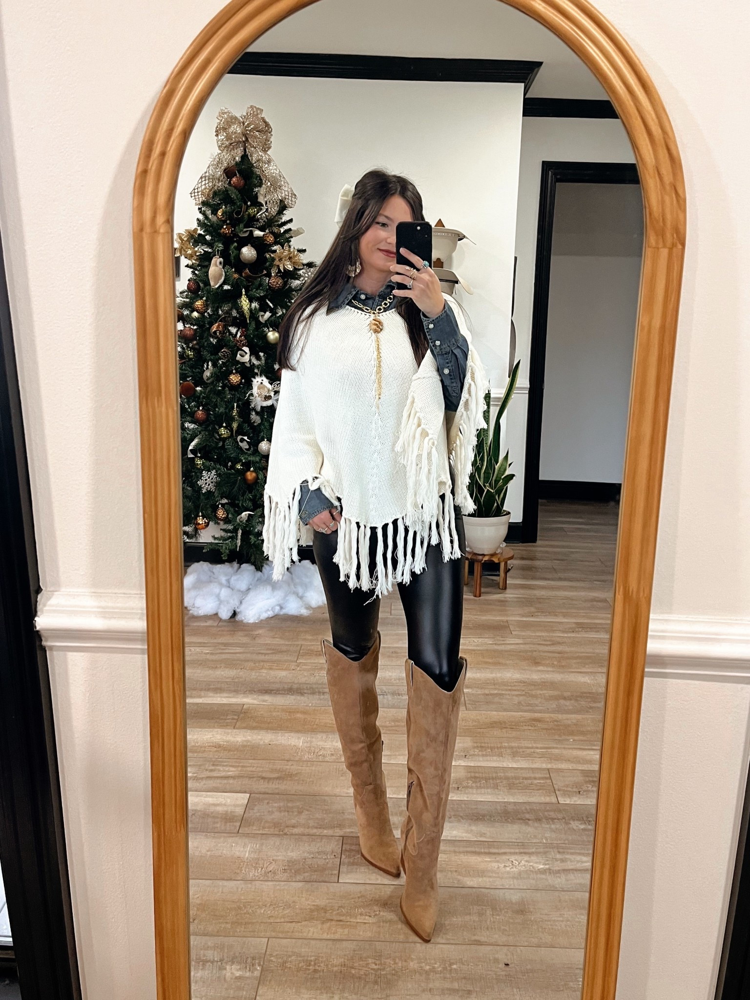 Loving everything about this fit! Leather leggings paired with dressy knee high boots, denim collared top, and fringe poncho on top! Girly western vibes for sure 🤎 

Necklace is older, from Highway Hippie code LORI10

#LTKPetite #LTKootd #LTKSaleAlert
