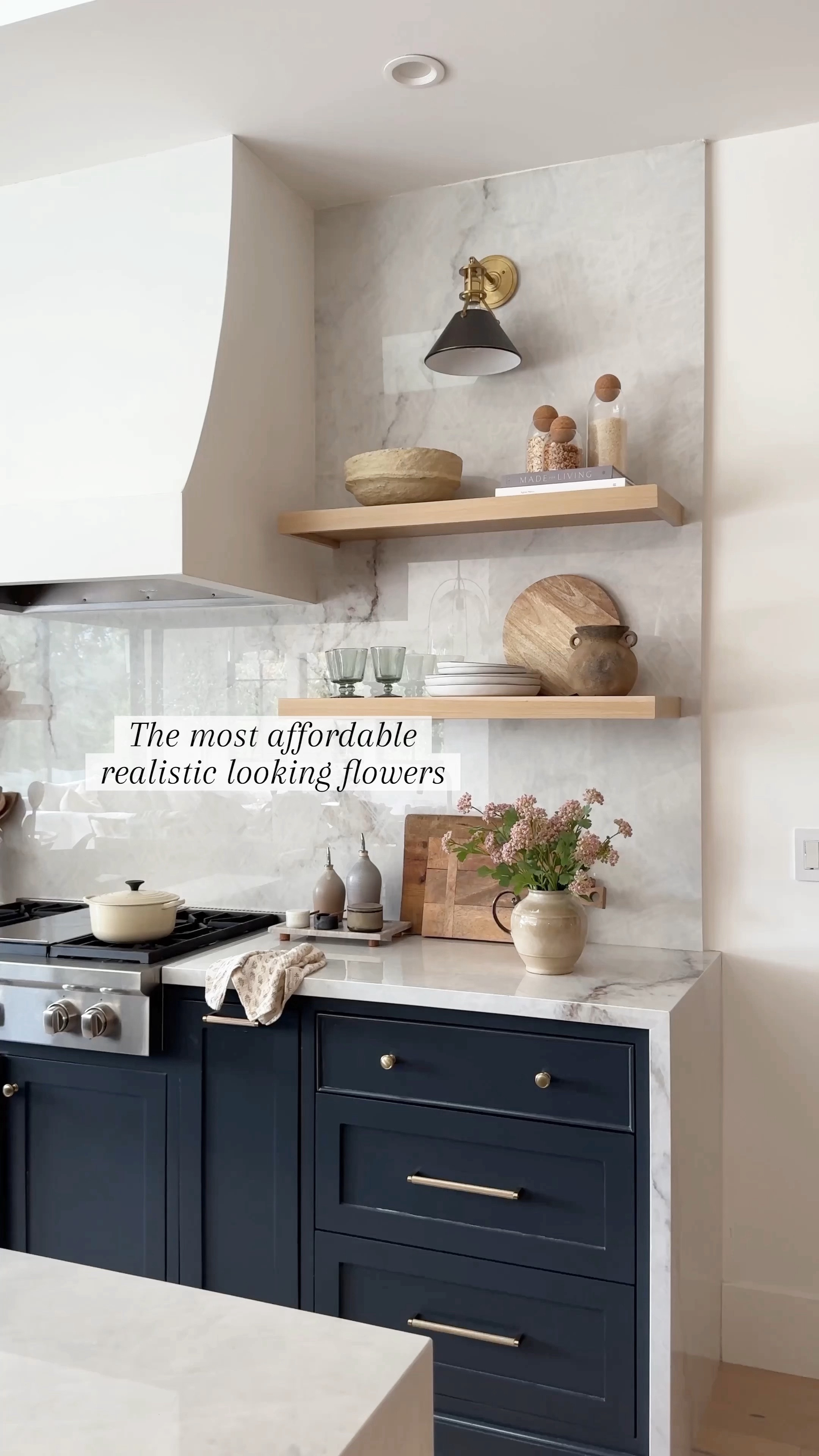 Realistic looking flowers. I used 5 stems.  Kitchen, decor, kitchen, accessories, drinking glasses, vintage glasses, wood cutting boards, brass pepper, mill, dough bowl, paper, Mâché, canisters, coffee, table books, artichokes, brass plates, olive oil, bowls, platters, plates, white plates target amber interiors vintage rug shop salt pepper mill Amazon fake flowers faux florals vase ceramic vase le creuset pink flowers

#LTKhome #LTKfindsunder50 #LTKMostLoved

#LTKSaleAlert #LTKVideo #LTKHome