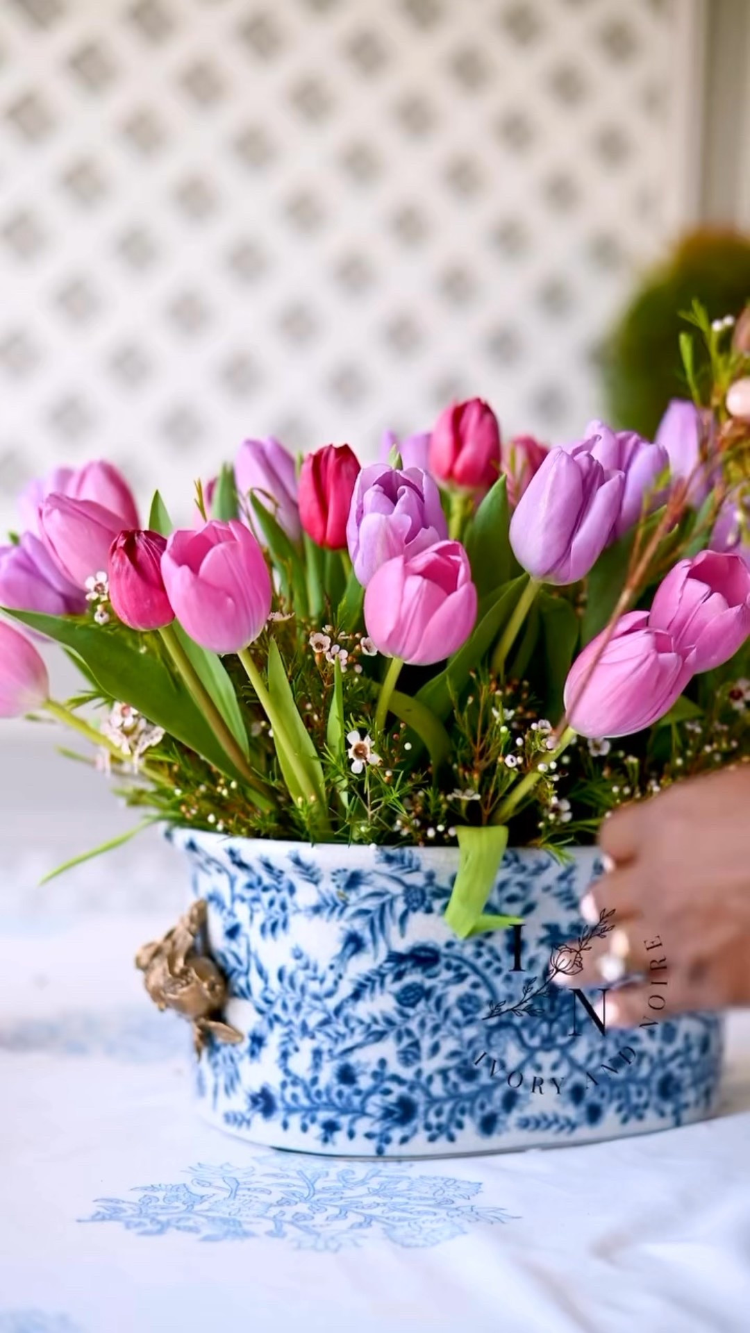 Tulips in a beautiful flower vase are a gorgeous classic that will add some much beauty to your home!
#tuliparrangement #diyflowers #blueandwhite 

#LTKSeasonal #LTKHome #LTKParties