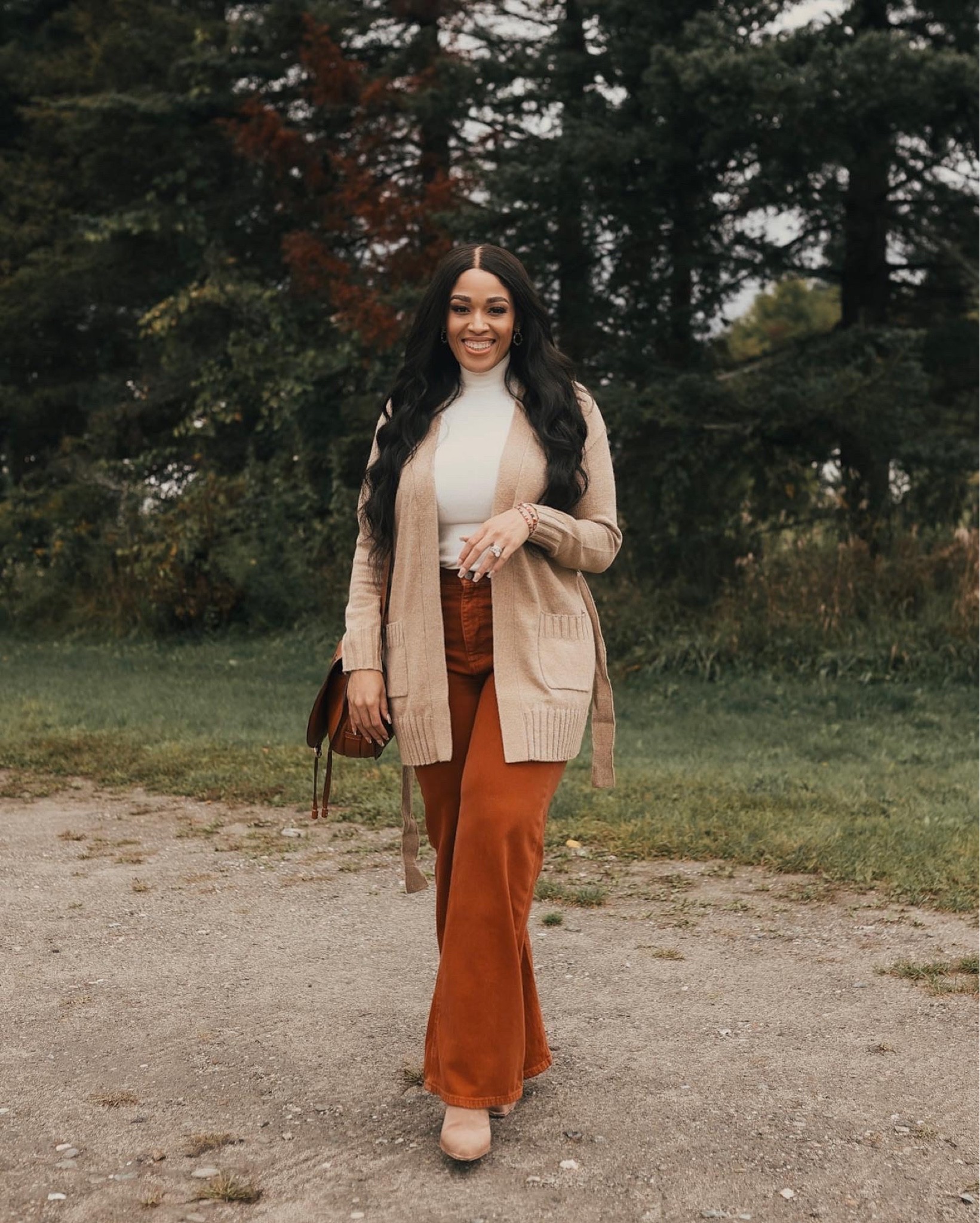 Layered looks are perfect for fall. Belted cardigan paired with sleeveless mock neck and wide leg jeans. 

#LTKunder100 #LTKSeasonal #LTKstyletip