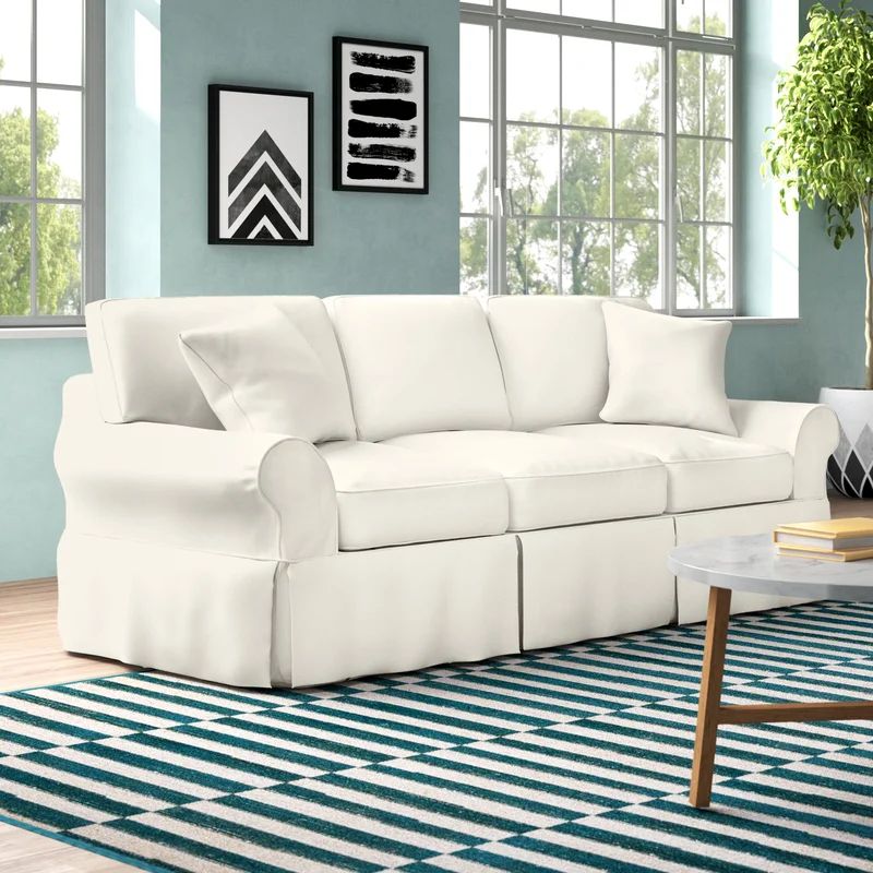 Lurdes 88'' Rolled Arm Slipcovered Sofa Bed with Reversible Cushions | Wayfair North America