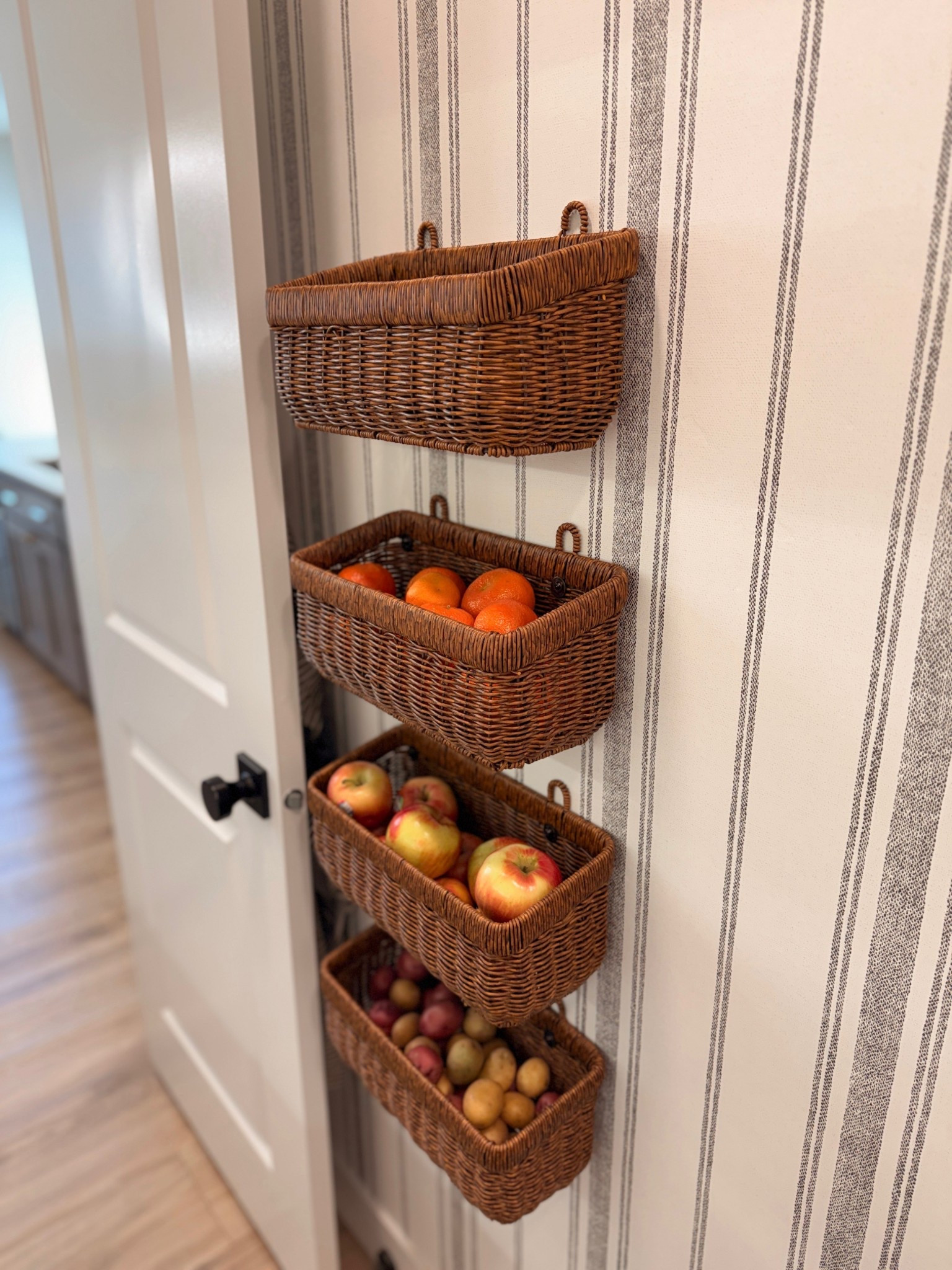 This wallpaper completely changed the feel of this space. The soft stripe adds just enough pattern to make it interesting, but it still feels classic and timeless. I love how it gives this little corner personality without overwhelming it. Such an easy way to elevate a pantry, hallway, or mudroom.

neutral striped wallpaper, peel and stick wallpaper, pantry makeover, mudroom decor, classic home style, cottage inspired, subtle pattern walls, home refresh ideas

#LTKHome #LTKfoodie #LTKSeasonal
