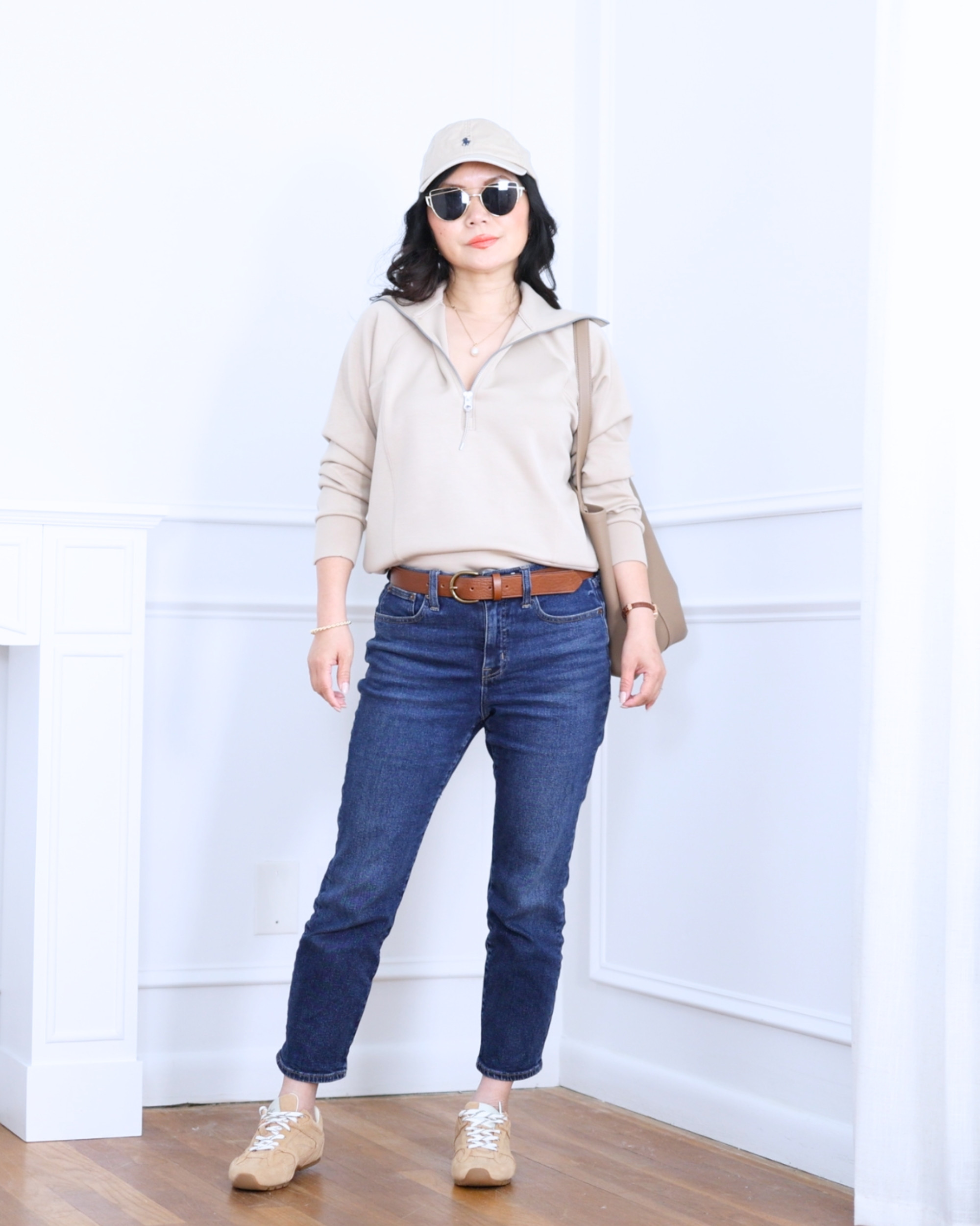 Half-zip sweater from Spanx paired with J.Crew Factory jeans, a Quince bag, a cap, and Steve Madden sneakers — sporty, comfortable, and effortlessly put together for everyday wear. I'm 5'2, wearing size S. 

 #LTKootd #LTKOver40 #LTKPetite