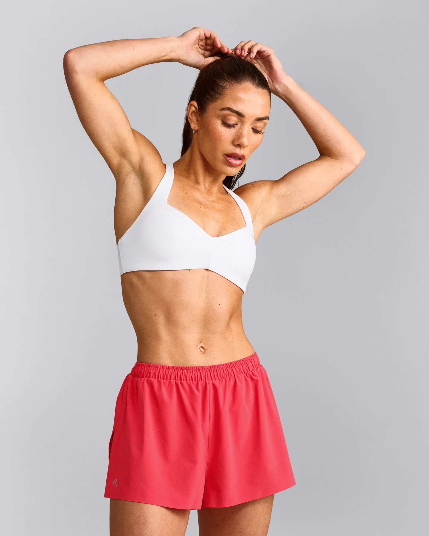 UnifiedMove\u2122 T Back Minimal Bralette with Reflective Logo 
 White | Oner Active (UK / US)