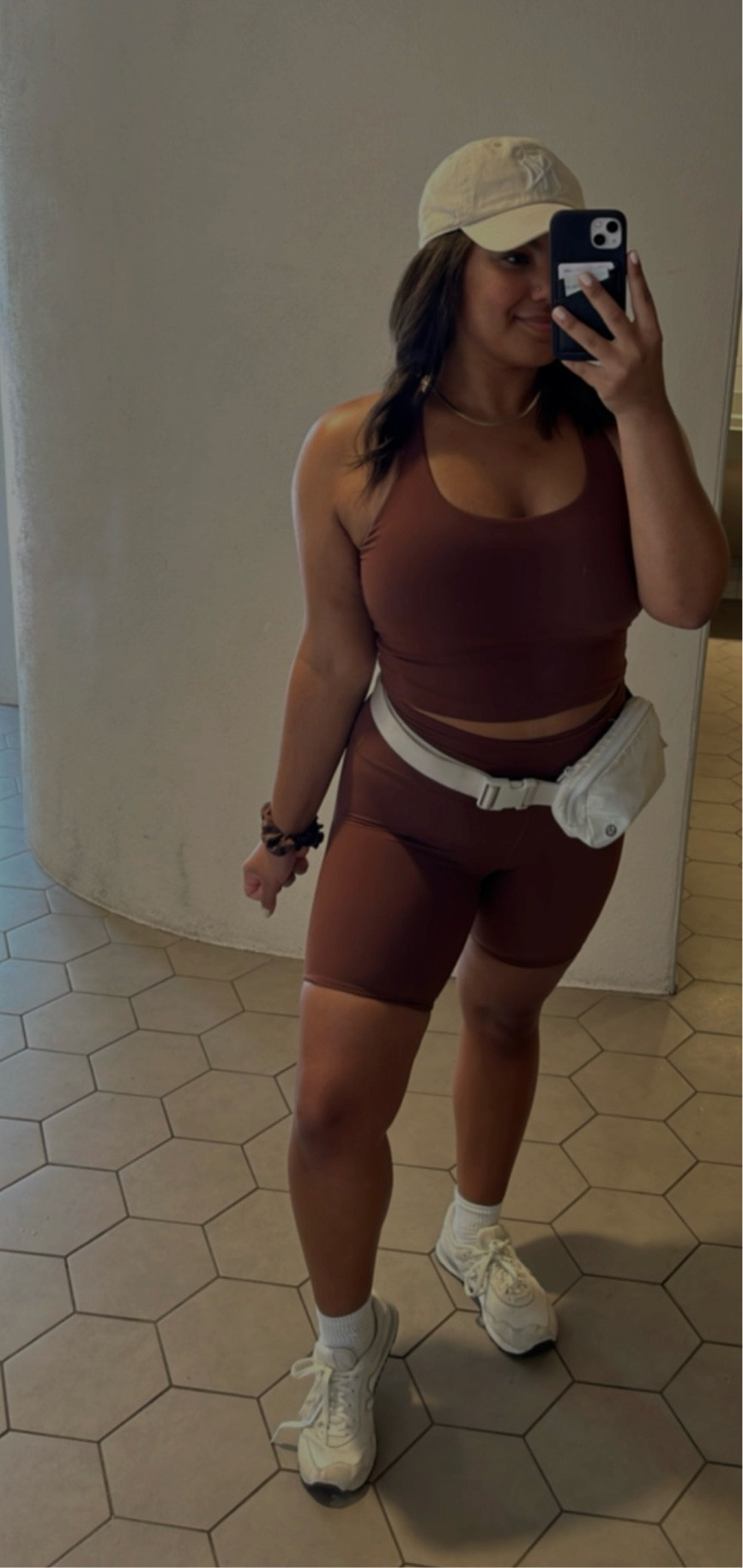 I’m so obsessed with this set!! The quality is amazing and reminds me a lot of lululemon. Im a DD and wore a large in the top with no bra. I opted for the longest length of shorts they had, 8inches. But they have 4 & 6” too! Paired it with new balances, my ny yankees hat, & a belt bag worn as a fanny lol. I wore this in the Disney sun and was comfy all day! 

#LTKActive #LTKTravel #LTKFitness