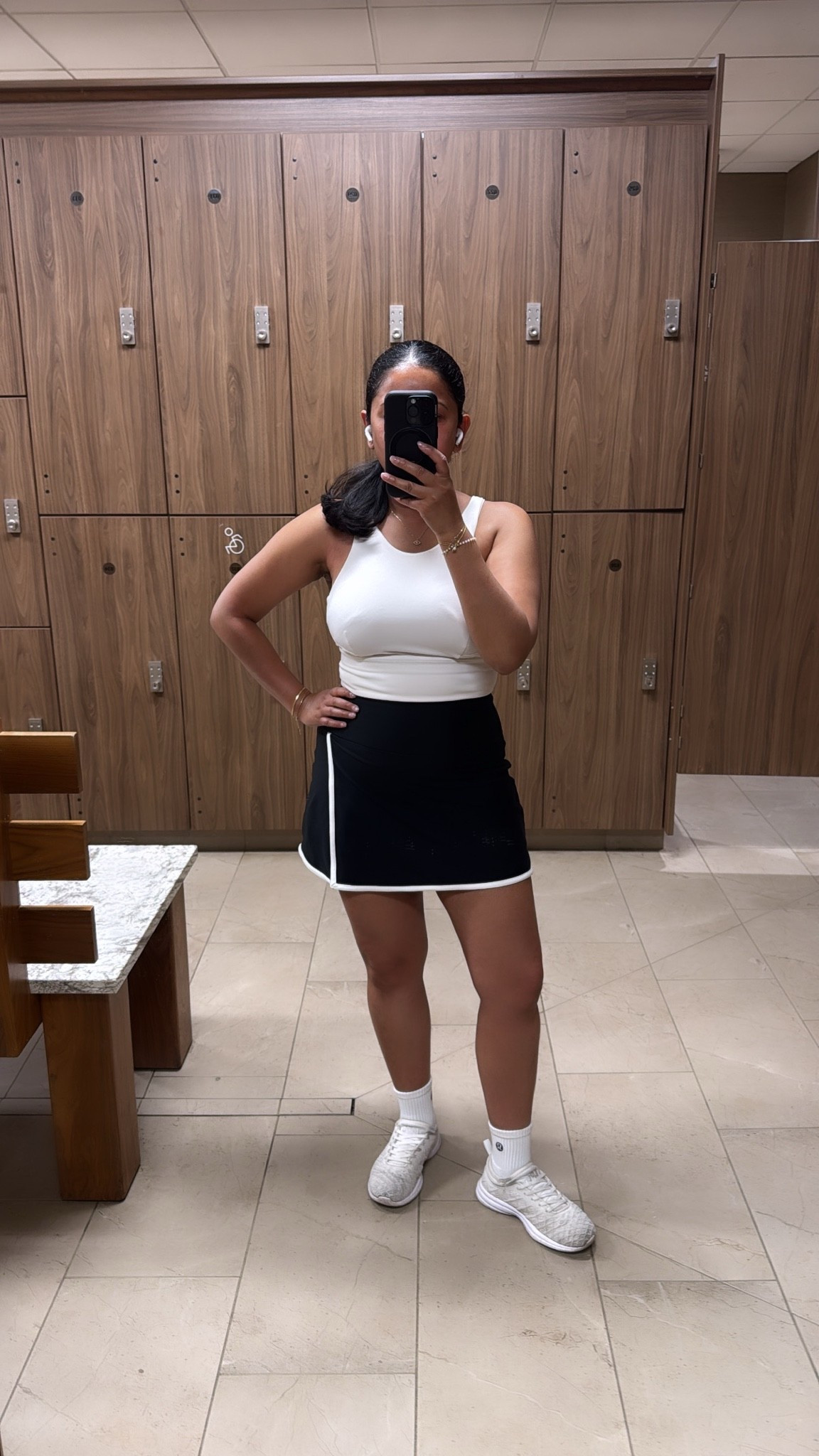 Ready to lift weights in my @lululemon sports bra, @abercrombie skirt and APL shoes 💪🏽

#LTKootd #LTKfitnessgoals #LTKActive