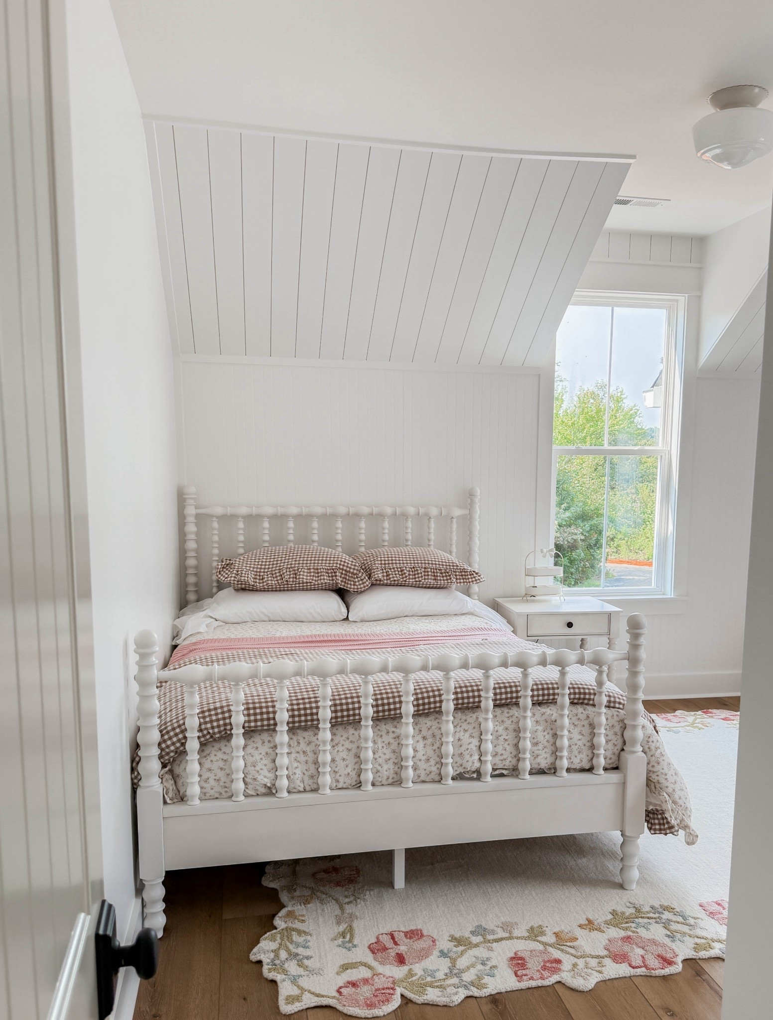 Darling girls room in brown with accents of pink. #whitebed #spindlebed #girlsroom #pioneerwoman #cottagebedroom #cottagecore #vintagegirlsroom #vintagestyle #vintagegirlsroom #pinkbedding #ginghambedding

#LTKHome