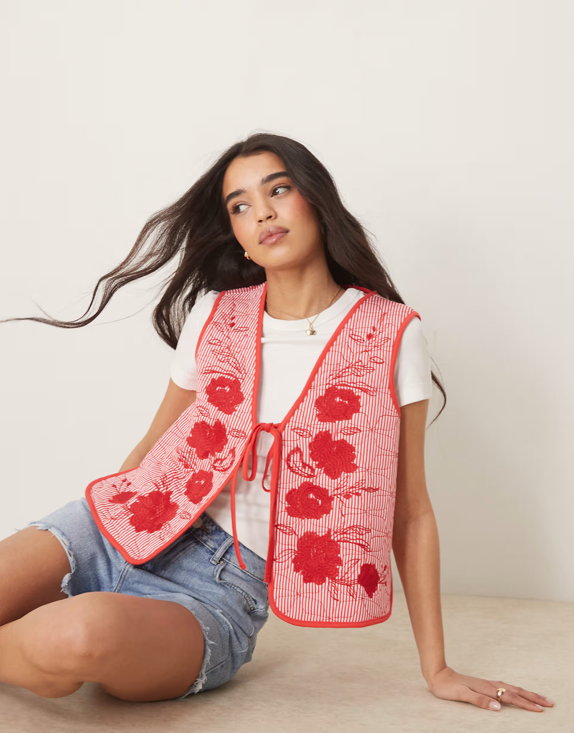 ASOS DESIGN quilted vest with striped red and white embroidery | ASOS (Global)