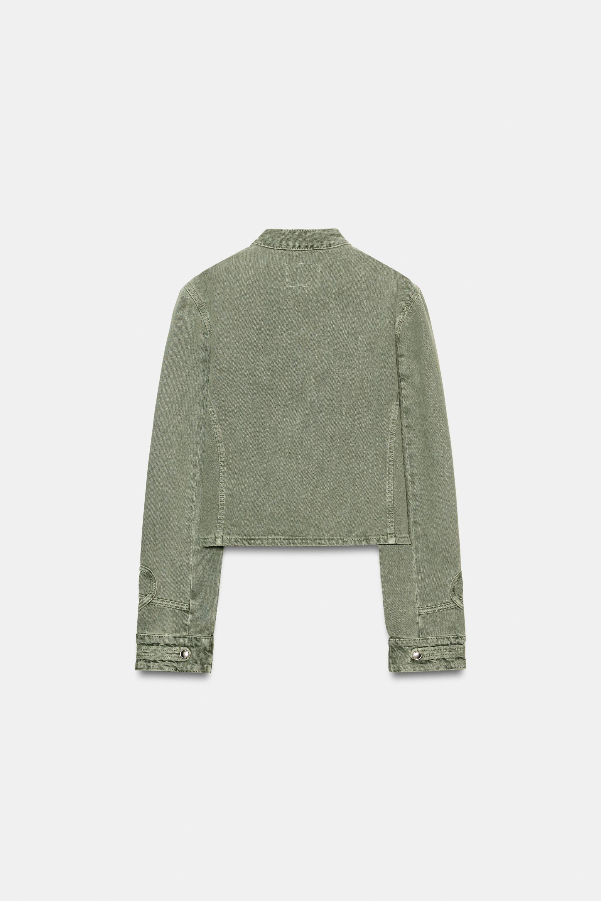 Round neck, long sleeve jacket with tabs. Featuring button details and applications in the same f... | Zara DE