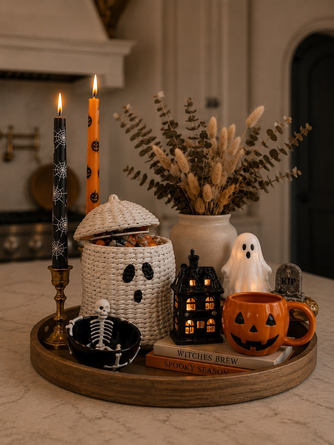 👻✨ Halloween decorating season is officially here! If you're styling your kitchen island, coffee table, or dining table, this cozy Halloween centerpiece is the perfect mix of spooky and chic.