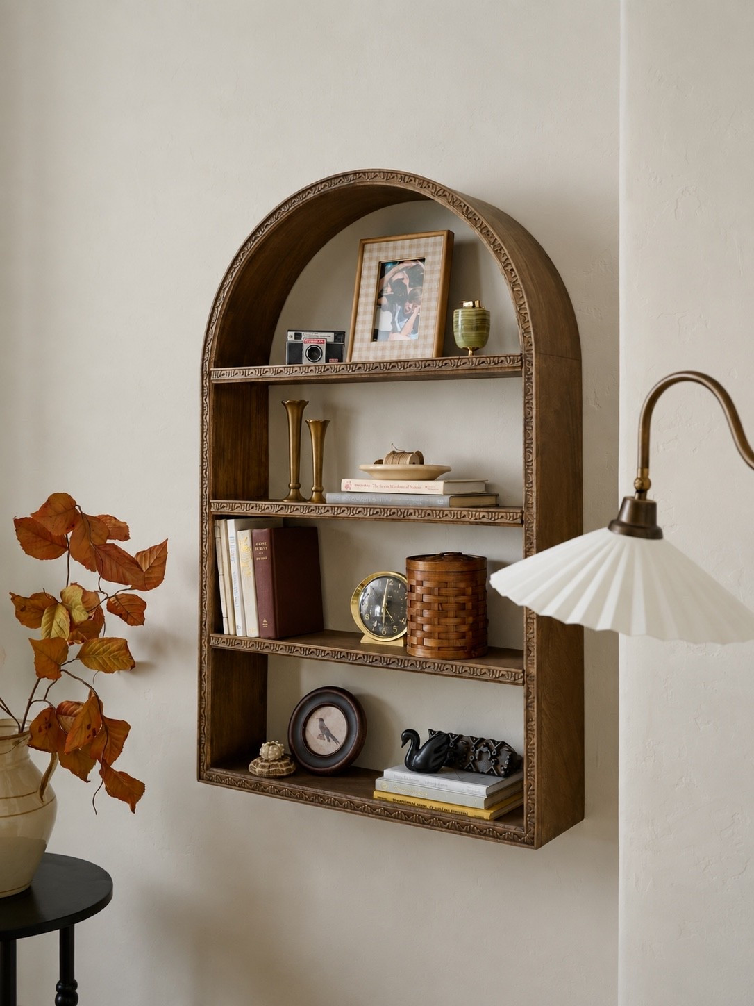 Beautiful arched wood wall shelf. I love how this is styled for fall.

#LTKHome #LTKSeasonal