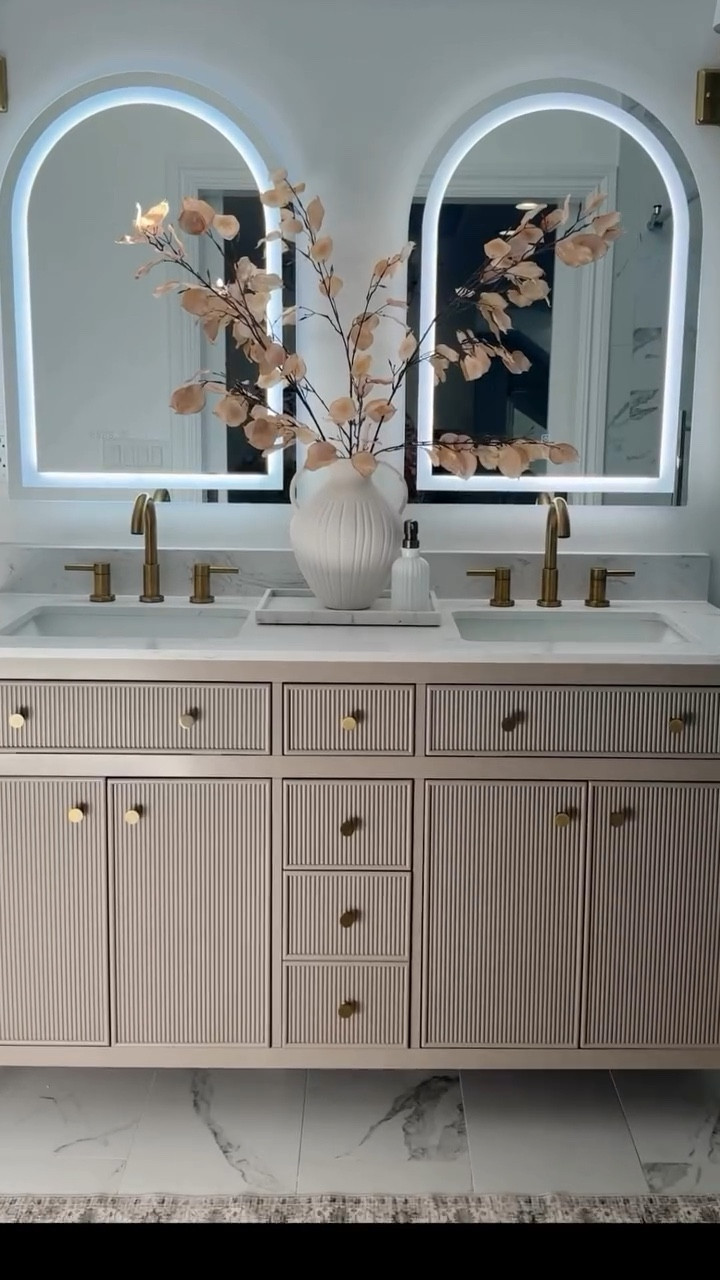 I still can’t believe I found this one of a kind bathroom vanity gem at @loweshomeimprovement. 💎

l have been looking for MONTHS for the perfect modern neutral toned vanity with brass details that didn’t look cheap or that it would break the bank. And when this beauty finally came back in stock, I hit that checkout button as fast as I could!

It is literally everything I was looking for and more. The double vanity, the color, the brass knobs, the fluted details…all for under $1000!! I am literally speechless 😱

I seriouslyyy cannot recommend this beauty enough.
100000000/10.

Comment “VANITY” & I’ll send a link!! 🤎