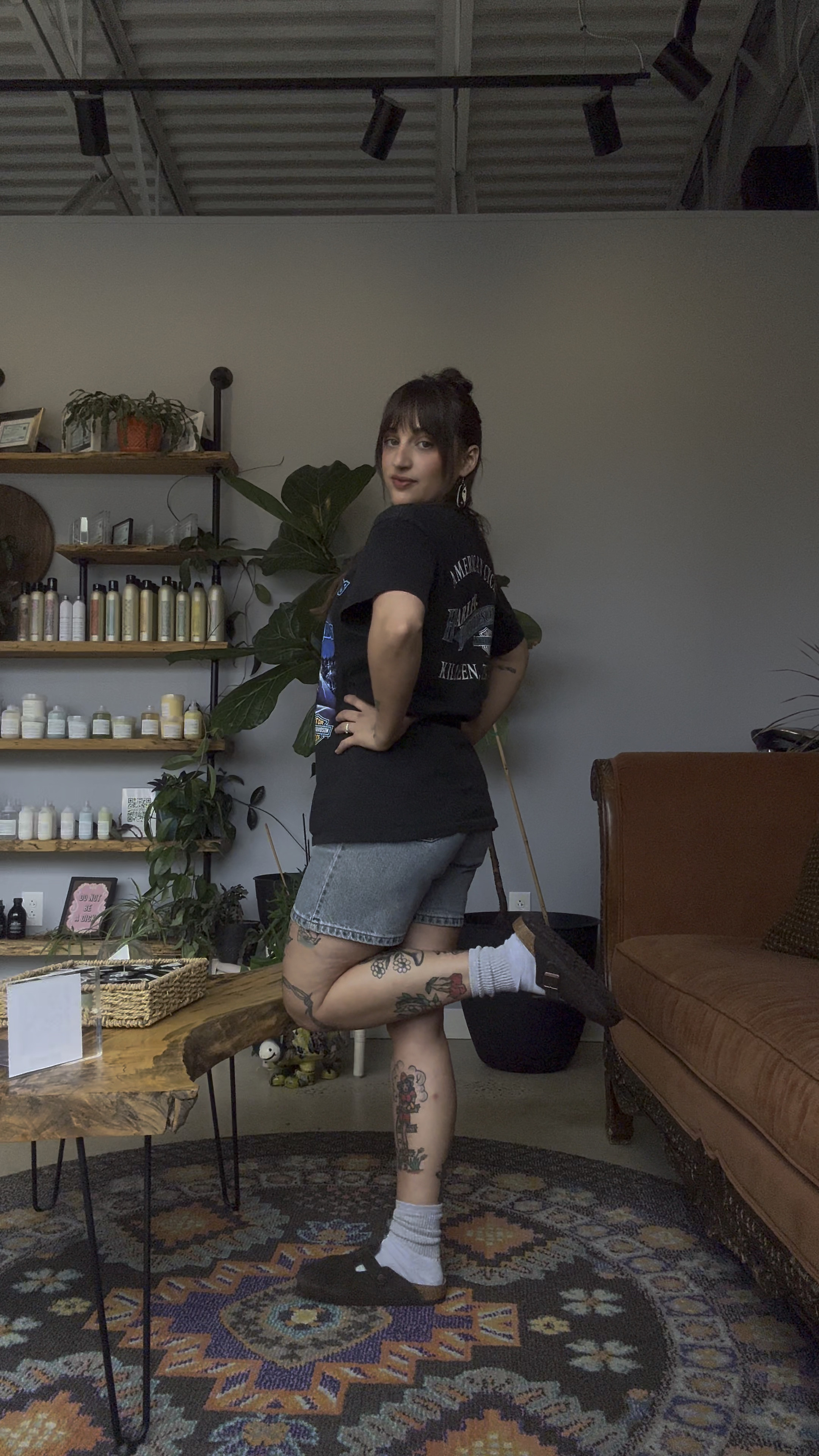 Cozy fit for work🧸 I find most of my Harley shirts/ Jean shorts either at thrift stores or on Depop. I got this Harley shirt on Depop. Shorts are Levi’s. Shoes are Birkenstocks. Earrings are from cashceramics.com ☯️ #workfit #ootd #cozyfit #hairstylist 

#LTKWorkwear #LTKShoeCrush #LTKU