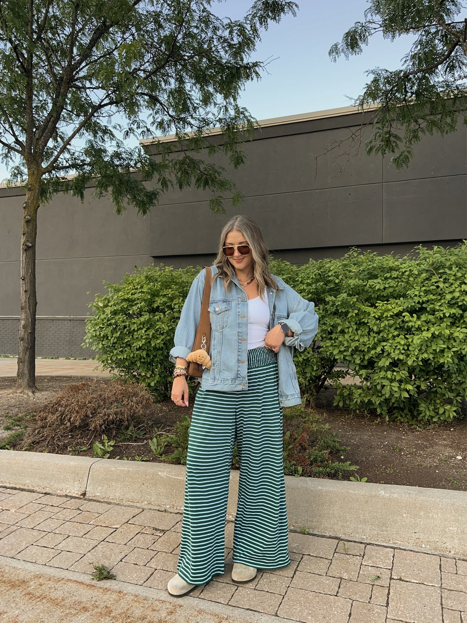 Comfy fall outfit! Wearing M in the bra free tank and L in the striped pants. Also linked similar sweater material pants for cooler weather! Sized up to XL in the denim jacket for an oversized fit. I’m a 9.5-10 shoe and wear a 40 in the Birkenstocks

#LTKfall #LTKsale #LTKmidsize
