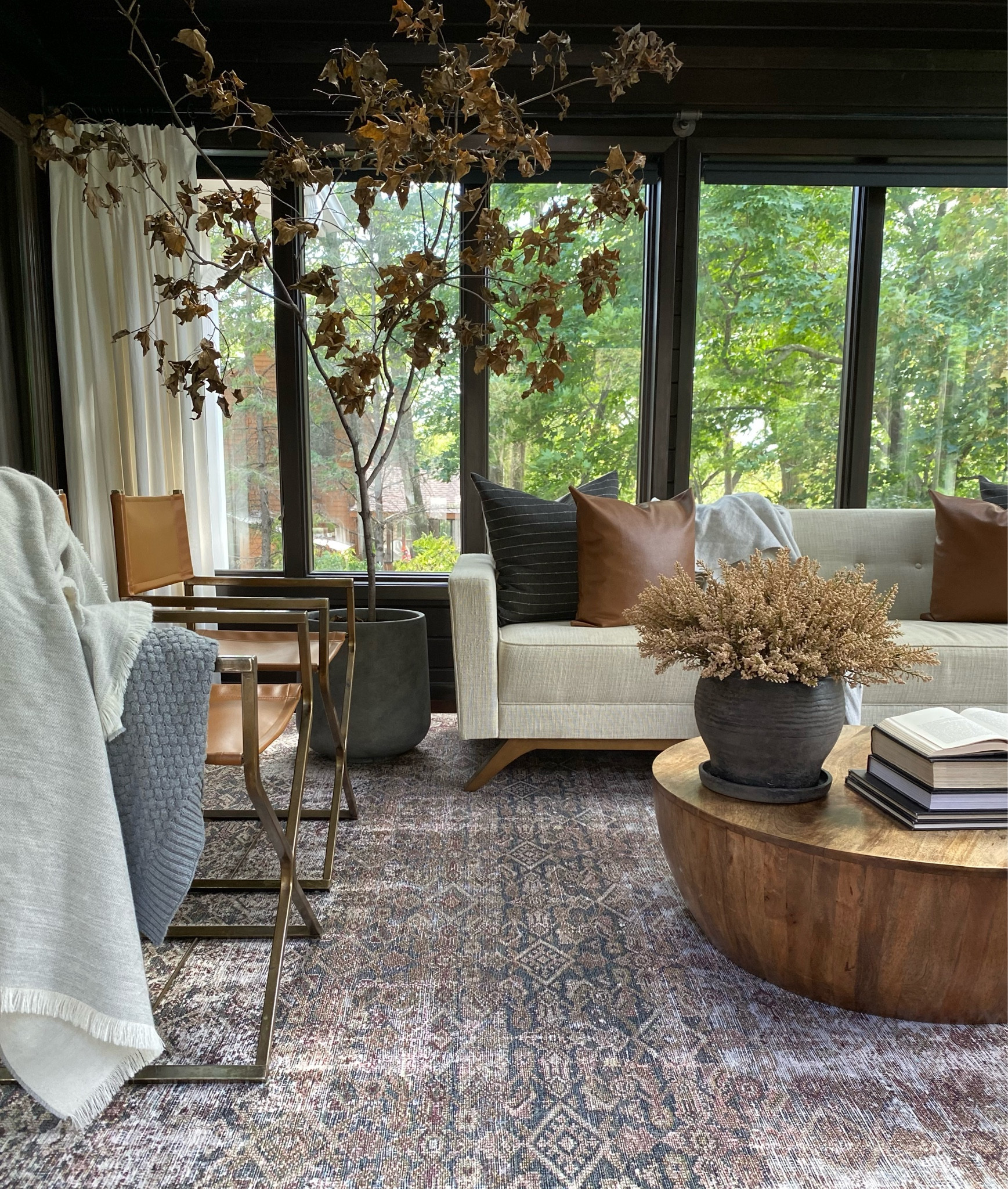 Fall touches to this mid century inspired living room

#LTKSeasonal #LTKunder100 #LTKhome