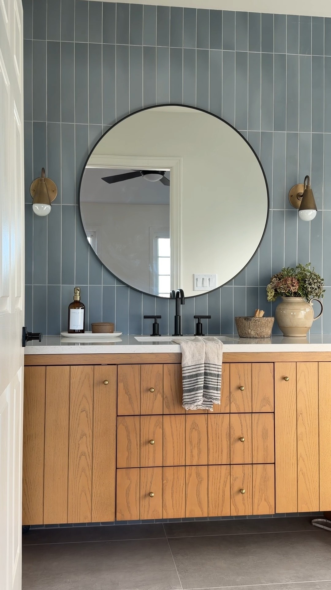 Love this bathroom for our clients remodel! This wood vanity is great quality and also has a USB charger

Brass black round mirror, picture, hydrangea, flowers, black faucet, plumbing, bathroom design, Wayfair

#LTKSaleAlert #LTKFindsUnder100 #LTKHome