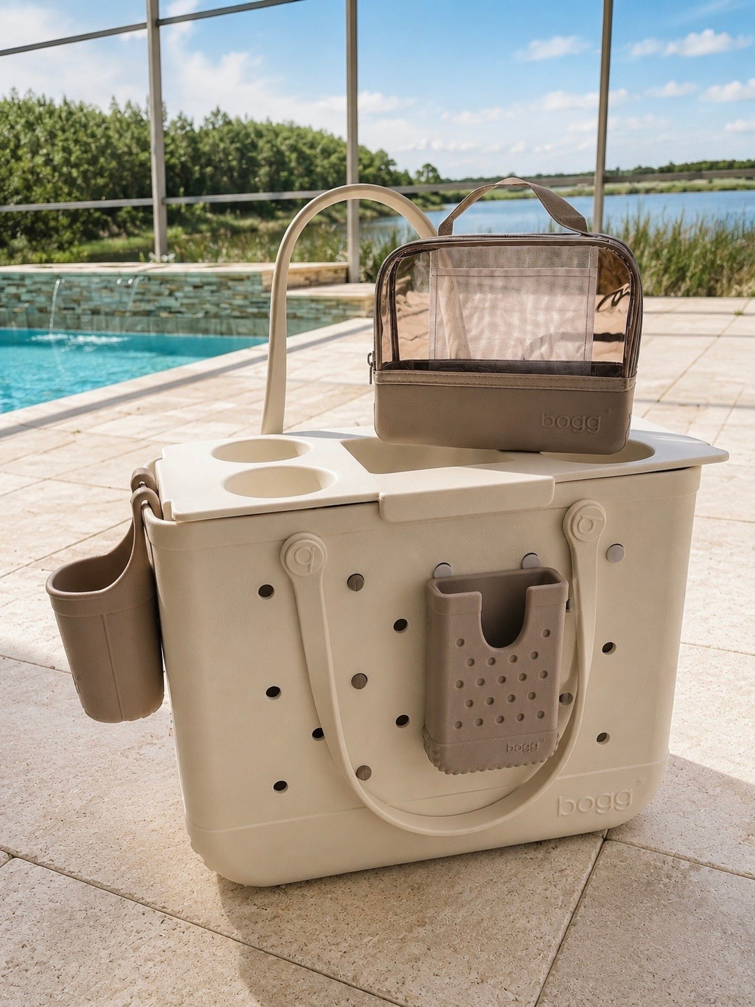 Pool days, but make them organized 🤍 This large Bogg Bag holds everything for the whole family, while the divider, cup holders, phone holder, tray and clear organizer keep the chaos surprisingly contained. Perfect for the pool, beach, sports, travel and every mom outing where you’re somehow responsible for carrying everyone’s entire life.

Bogg Bag, large Bogg Bag, Original Bogg Bag, Bogg Bag accessories, Bogg Bag divider, Bogg Bag organizer, Bogg Bag insert, Bogg Bag cup holder, Bogg Bag phone holder, Bogg Bag tray, Bogg Bag topper, Bogg Bag clear pouch, beach bag, large beach bag, waterproof beach bag, pool bag, large pool bag, waterproof pool bag, mom beach bag, family beach bag, family pool bag, tote bag for moms, oversized tote bag, waterproof tote bag, washable tote bag, durable beach tote, neutral beach bag, cream Bogg Bag, beige Bogg Bag, taupe Bogg Bag, poolside essentials, beach essentials, summer bag, summer travel bag, vacation essentials, resort essentials, lake day bag, boat bag, swim bag, kids pool bag, toddler beach essentials, baby pool essentials, sports mom bag, baseball mom bag, soccer mom bag, teacher tote bag, carryall tote, organized beach bag, beach bag accessories, pool bag accessories

#LTKSwim #LTKTravel #LTKSeasonal