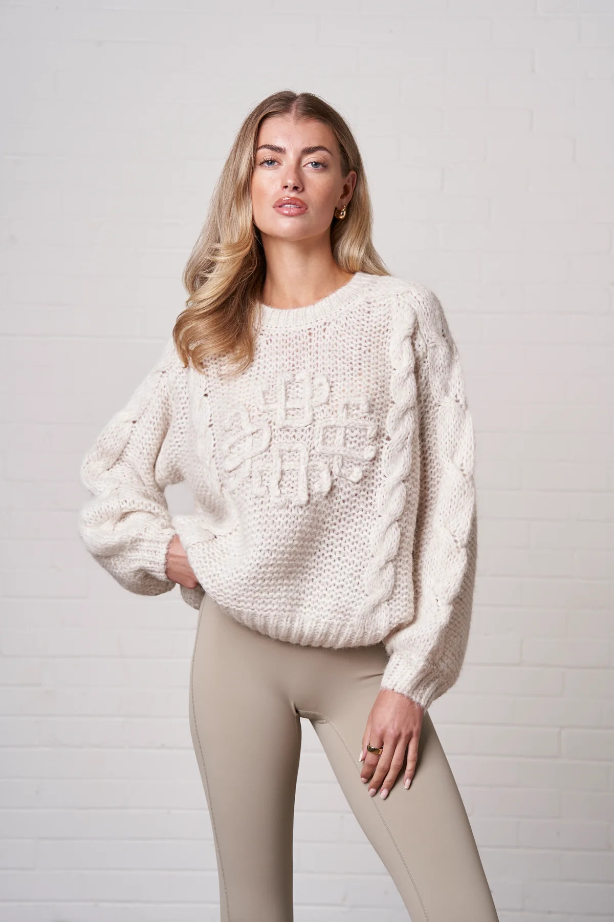 EMBLEM PLAITED OVERSIZED KNIT JUMPER - STONE | The Couture Club