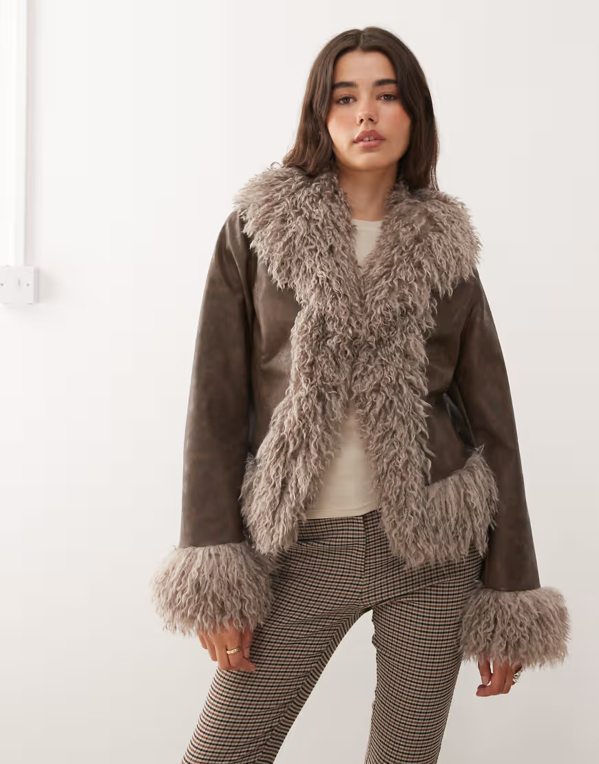 Reclaimed Vintage faux fur trim leather look short jacket in brown | ASOS (Global)