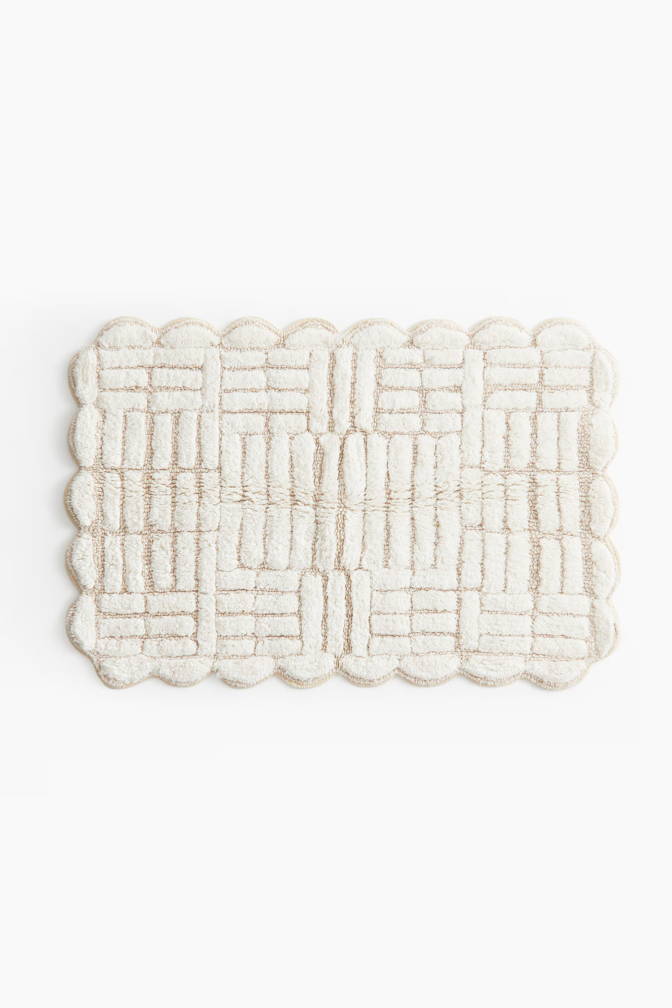 Tapis de bain en coton tufté | H&M (FR, IT, ES, PT, BE)