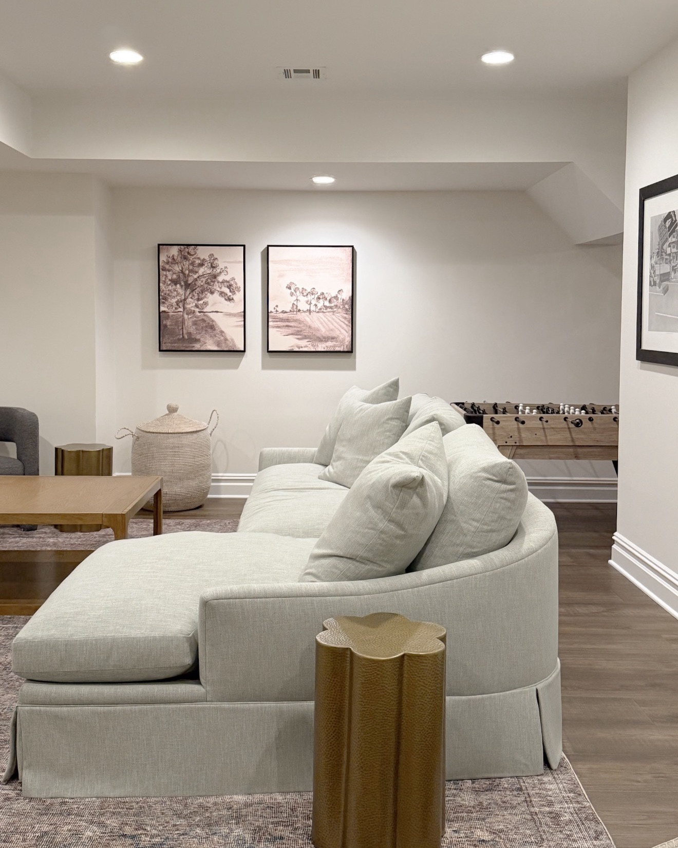 Our basement sectional from @Kathy Kuo Home is on sale! Such a stunner — I love this Sea Spray performance fabric (the color is the perfect neutral!) and the sofa itself is SO comfortable. I love the rounded back design!! Use code APRILSHIP for 20% off site-wide on eveyrthing(!) and free shipping over $2000

Living room, living room inspo, living room decor, basement inspo, basement design, media room spring home, spring decorating, coffee table decor, coffee table accessories, girlonthehudson, neutral home, modern coastal, minted art, cozy home

#LTKdayinmylife #LTKSaleAlert #LTKHome