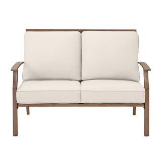 Hampton Bay Geneva Brown Wicker Outdoor Patio Loveseat with CushionGuard Almond Tan Cushions FRS6... | The Home Depot