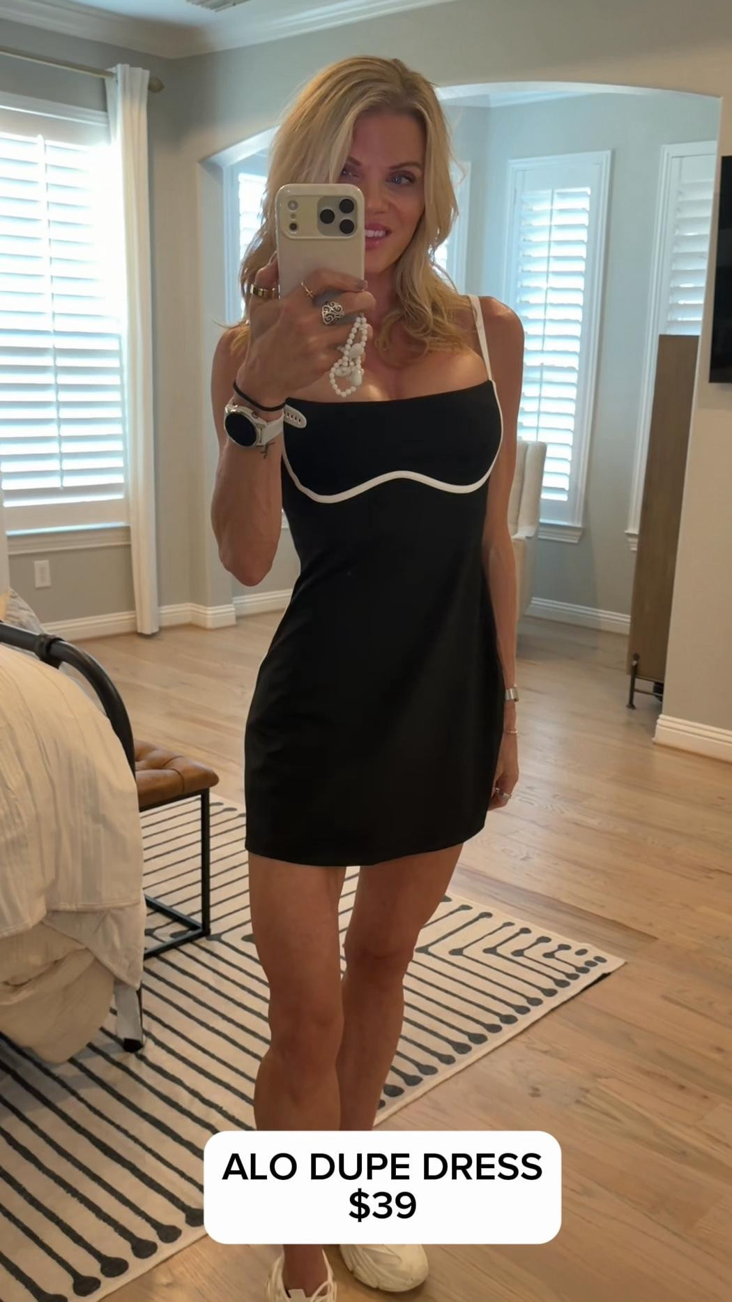 So similar to the Alo Airbrushed Streamlined Dress but for nearly $100 less! Wearing size Small and I would have preferred a XS (but they don’t offer that) as the tummy area and underneath liner shorts are a bit too big but for the price, it’s definitely a keeper!!! Plan to get in other colors! Got tons of compliments at my son’s tennis tournament! 

#LTKFindsUnder50 #LTKActive #LTKStyleTip