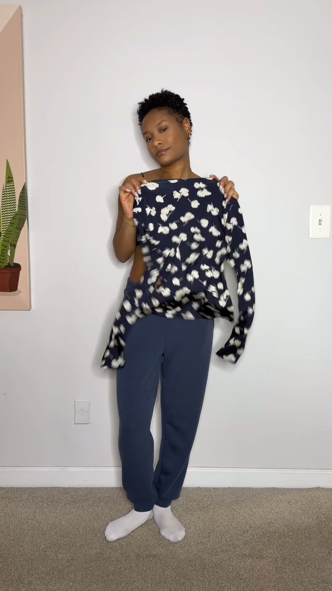 And here’s how styled the dusk navy sweats! Layer a printed turtleneck underneath and wear your sweats as is for an easy look. 

#LTKActive #LTKdayinmylife #LTKootd