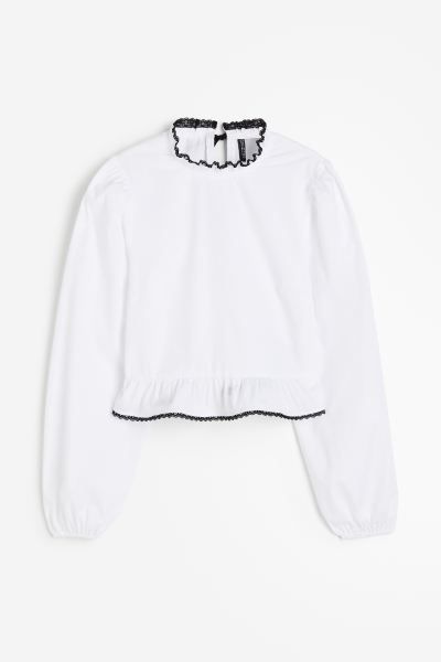 Puff-sleeved peplum blouse | H&M (UK, MY, IN, SG, PH, TW, HK)
