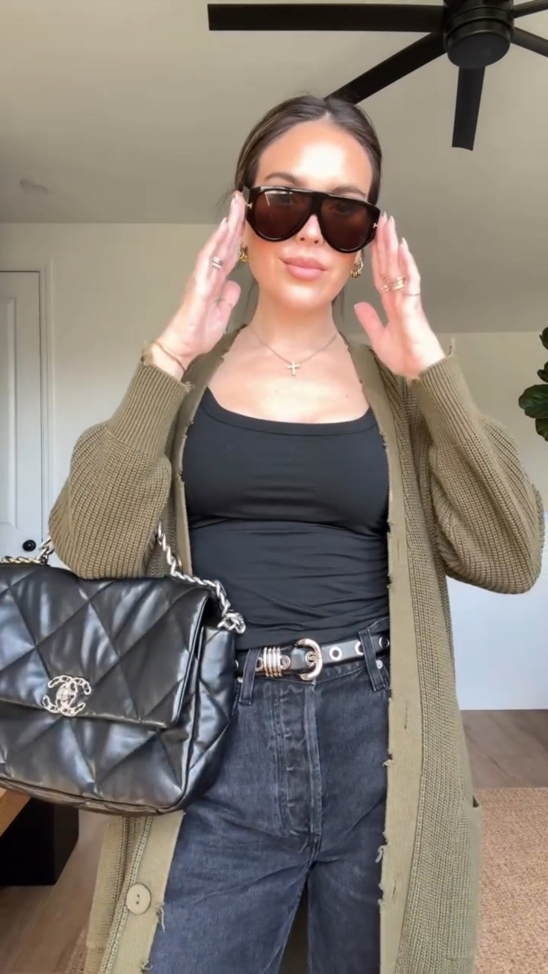 Madewell def copied dehanche belts on a few of their pieces 

Jeans - @citizensofhumanity Gwendolyn style 
Cardigan - @ser.o.ya (I cut the shoulder pads out today so that I start wearing it- it’s 100% cotton and so comfortable). 
Sunglasses - TF Bronson do0ps from Amazon for $10. 
Lip - @patricktabeauty pink salted caramel 
I should have worn a white tshirt w this, but they’re all dirty so here we are 

if you’re in the market i got these Madewell leather belts for $50 and under. The belt currently on my wish list is the dehanche revenge, so I’m seeing if I actually start to wear belts first. Linked a bunch of embellished ones for you if you like this look too.

#LTKBeauty #LTKgrwm #LTKootd