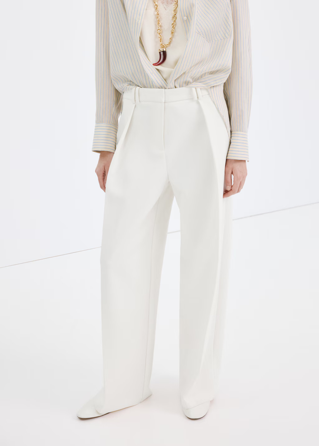 Wide-leg mid-rise pleated trousers - Women | MANGO United Kingdom | MANGO (UK)