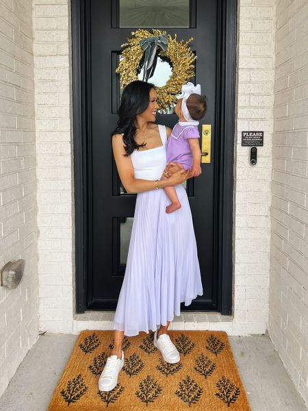 Mommy and me coordinating outfits with baby girl. Wearing a square neck bodysuit that’s nursing friendly tucked into a pleated elastic waist skirt from Aritzia! Bạn girl is wearing a knit lilac romper that’s incredible quality with a stretchy bow headband  

#LTKSeasonal #LTKfamily #LTKbaby