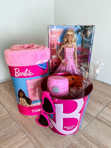 Barbie Movie Gift 💕🍿
Taking my daughter to the Barbie movie!!  I put a few things together to gift her before we go to the theater! 

Barbie Merch | Barbie gift for girls | Barbie party | Barbie Sunglasses | Barbie Cup | Barbie Blanket | Barbie Movie Margot Doll | Barbie Popcorn Bucket | Barbie Snacks | Barbie Treats | Barbie Candy

#LTKfamily #LTKkids #LTKFind