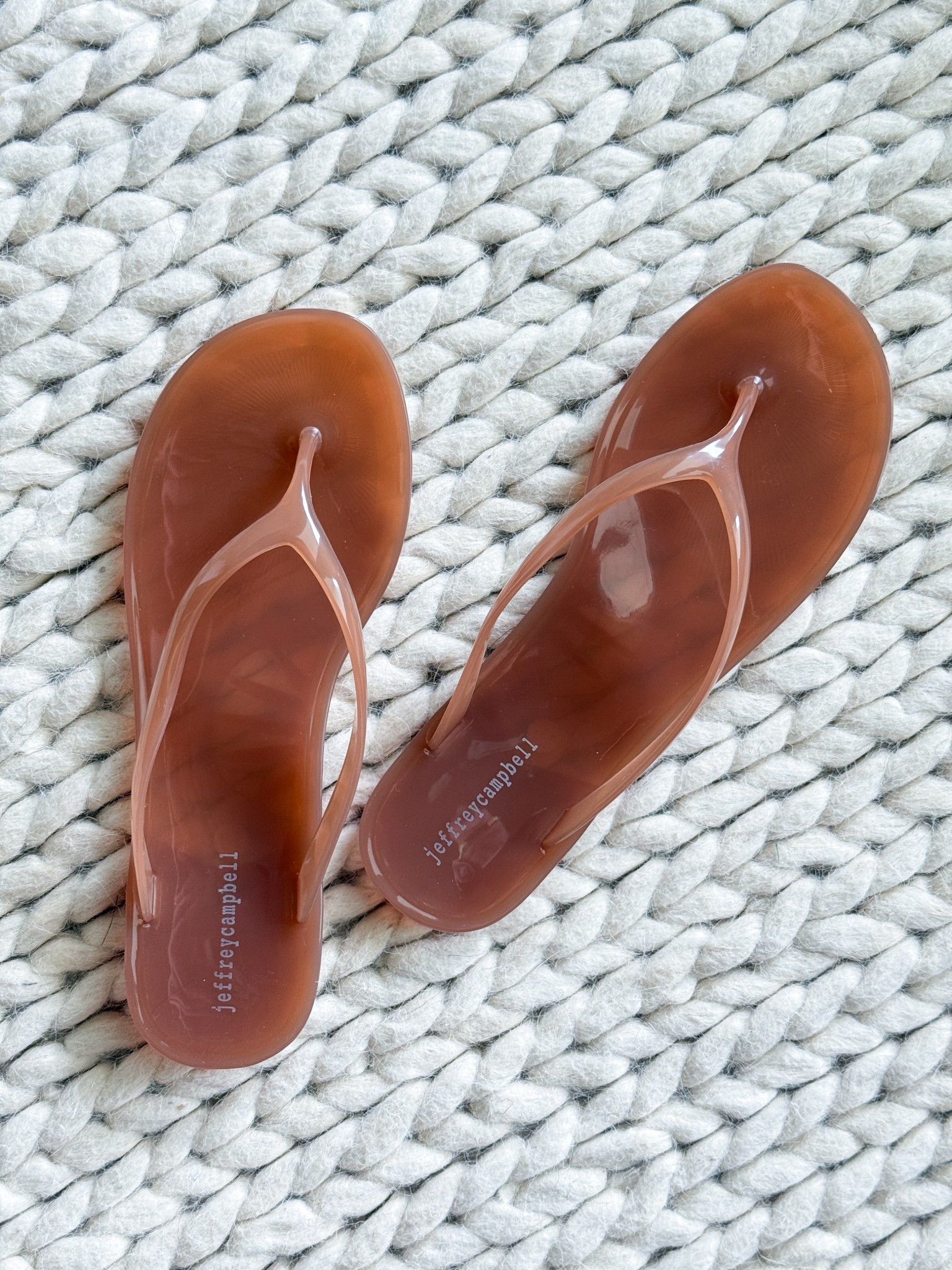 These Jeffrey Campbell jelly flip flops are summer perfection. They’re giving vintage pool day vibes in the best way. Fun, flexible, lightweight. I’m obsessed with this nude translucent color, but they come in a few other cute options too. They run a little small, so definitely size up one full size for the best fit. Perfect for errands, beach days, & lounging around with zero effort.

jeffrey campbell jelly flip flops – size up summer shoes – translucent jelly sandals – 90s inspired summer shoes – under 50 summer footwear – flexible casual sandals – peachy summer slide – affordable trendy sandals – throwback jelly flip flops – comfy lightweight summer shoes – cute jelly shoes for women – ltk summer footwear pick – nostalgic summer sandals – easy slide on sandals – warm weather shoe essentials

#LTKStyleTip #LTKU #LTKShoeCrush