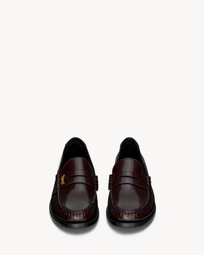 penny loafers WITH LEATHER SOLE, DECORATED WITH THE CASSANDRE and featuring a saint laurent embos... | Saint Laurent Inc. (Global)