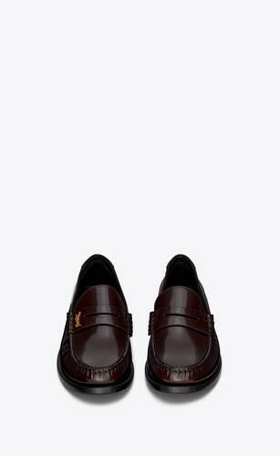 penny loafers WITH LEATHER SOLE, DECORATED WITH THE CASSANDRE and featuring a saint laurent embos... | Saint Laurent Inc. (Global)